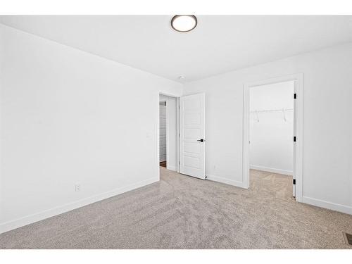 935 Langholm Drive Se, Airdrie, AB - Indoor Photo Showing Other Room