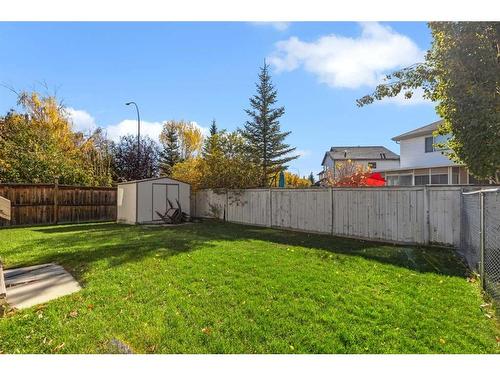 605 Panorama Hills Drive Nw, Calgary, AB - Outdoor With Backyard