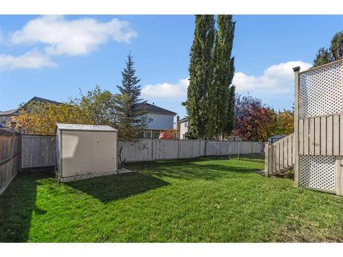 605 Panorama Hills Drive Nw, Calgary, AB - Outdoor With Backyard