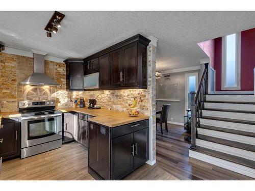 28 Bermondsey Rise Nw, Calgary, AB - Indoor Photo Showing Kitchen With Stainless Steel Kitchen With Upgraded Kitchen