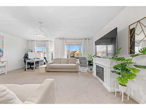 60 Brightoncrest Point Se, Calgary, AB - Indoor Photo Showing Living Room