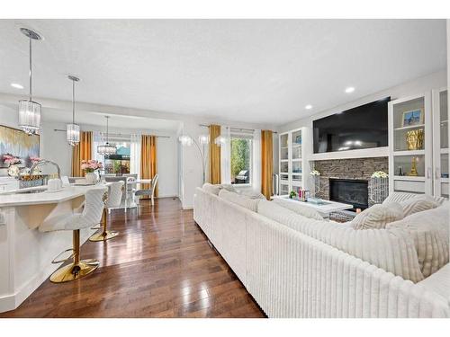 60 Brightoncrest Point Se, Calgary, AB - Indoor Photo Showing Living Room With Fireplace