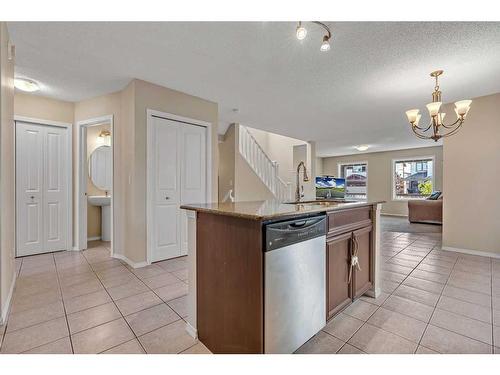 1017 Kingston Crescent Se, Airdrie, AB - Indoor Photo Showing Kitchen