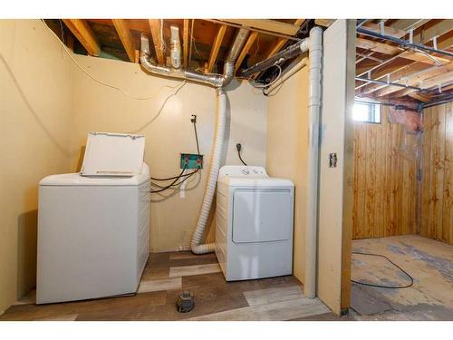 74 Pennsburg Way Se, Calgary, AB - Indoor Photo Showing Laundry Room