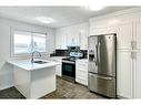 74 Pennsburg Way Se, Calgary, AB  - Indoor Photo Showing Kitchen With Stainless Steel Kitchen With Double Sink 