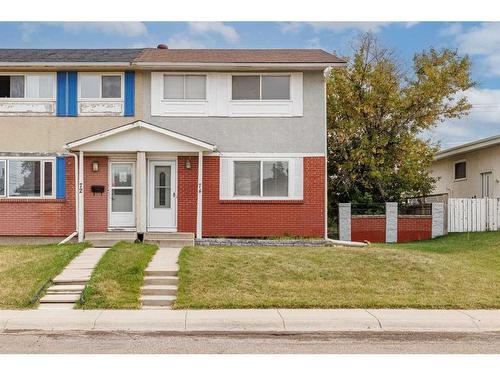 74 Pennsburg Way Se, Calgary, AB - Outdoor With Facade