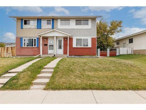 74 Pennsburg Way Se, Calgary, AB - Outdoor With Facade