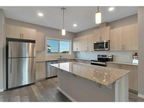 21462 Sheriff King Street Sw, Calgary, AB - Indoor Photo Showing Kitchen With Upgraded Kitchen