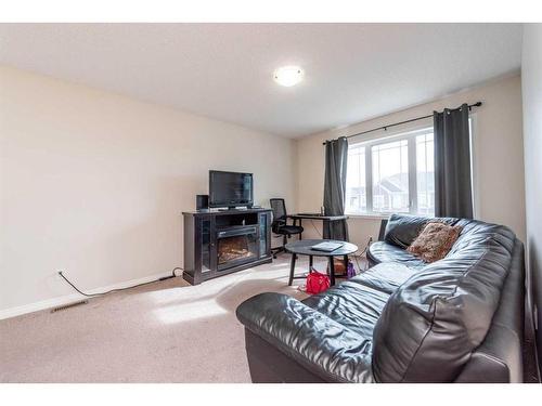 286 Yorkville Manor Sw, Calgary, AB - Indoor With Fireplace