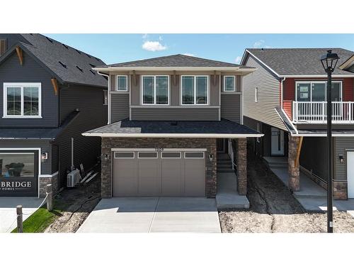 1309 Bayview Point Sw, Airdrie, AB - Outdoor With Facade