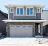 1309 Bayview Point Sw, Airdrie, AB  - Outdoor With Facade 