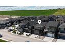 1309 Bayview Point Sw, Airdrie, AB  - Outdoor With Facade 