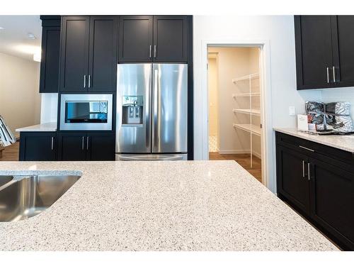 1309 Bayview Point Sw, Airdrie, AB - Indoor Photo Showing Kitchen With Stainless Steel Kitchen