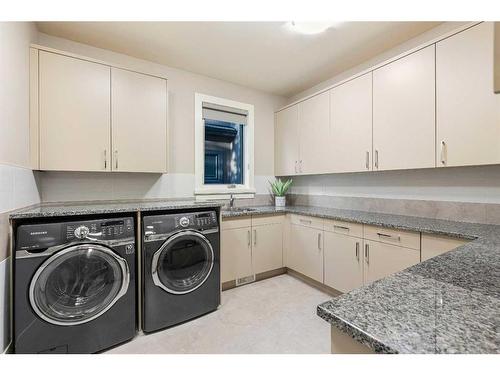 32 Aspen Ridge Manor Sw, Calgary, AB - Indoor Photo Showing Laundry Room