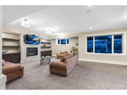 32 Aspen Ridge Manor Sw, Calgary, AB - Indoor With Fireplace