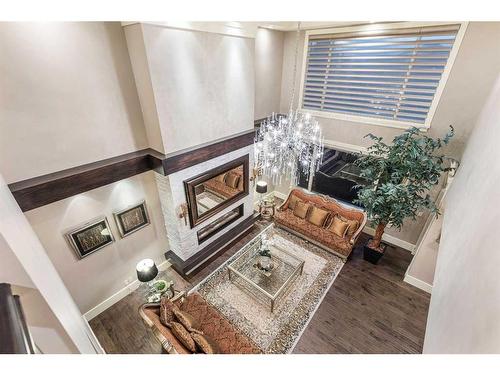 32 Aspen Ridge Manor Sw, Calgary, AB - Indoor With Fireplace