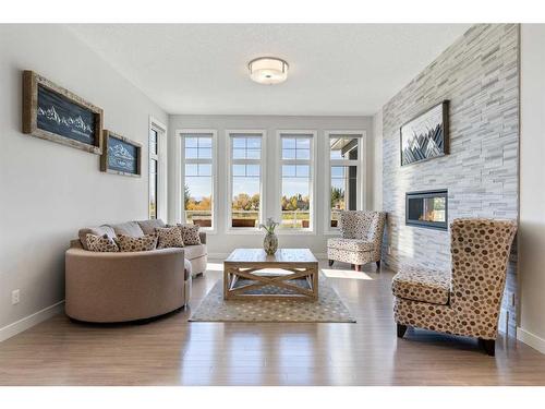 162 Ranch Road, Okotoks, AB - Indoor Photo Showing Living Room With Fireplace