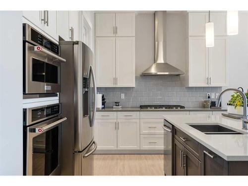 162 Ranch Road, Okotoks, AB - Indoor Photo Showing Kitchen With Double Sink With Upgraded Kitchen