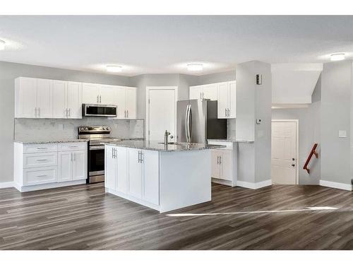 16161 Shawbrooke Road Sw, Calgary, AB - Indoor Photo Showing Kitchen With Upgraded Kitchen