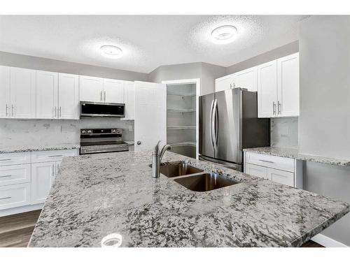 16161 Shawbrooke Road Sw, Calgary, AB - Indoor Photo Showing Kitchen With Double Sink With Upgraded Kitchen