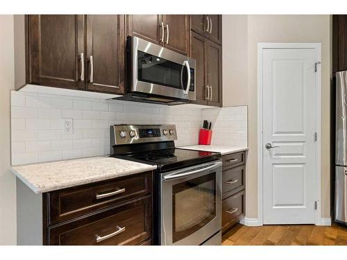 73 Kingsbridge Place Se, Airdrie, AB - Indoor Photo Showing Kitchen