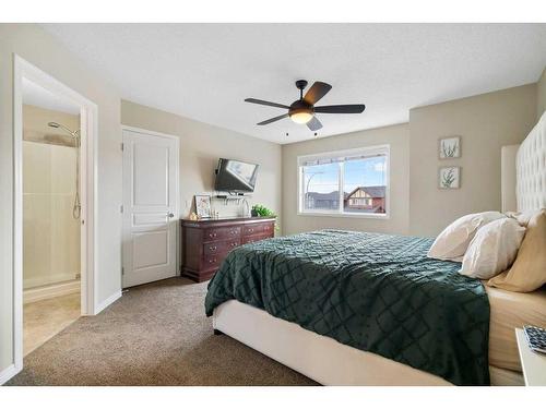 73 Kingsbridge Place Se, Airdrie, AB - Indoor Photo Showing Bedroom