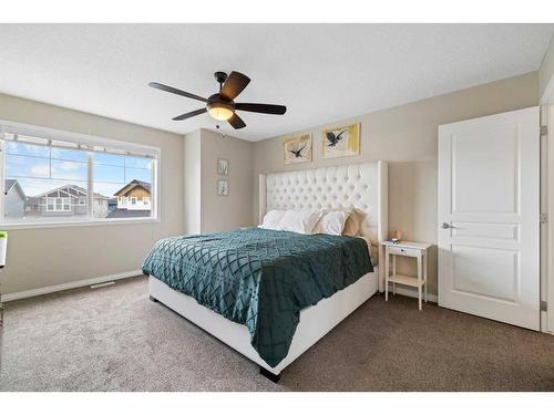 73 Kingsbridge Place Se, Airdrie, AB - Indoor Photo Showing Bedroom