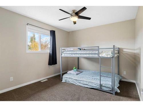 73 Kingsbridge Place Se, Airdrie, AB - Indoor Photo Showing Bedroom