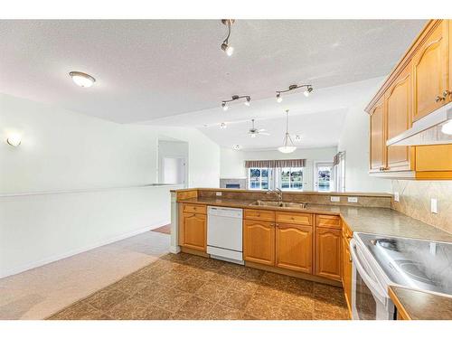 159 Westlake Bay, Strathmore, AB - Indoor Photo Showing Kitchen With Double Sink