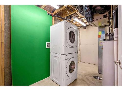 103 Aspen Hills Drive Sw, Calgary, AB - Indoor Photo Showing Laundry Room