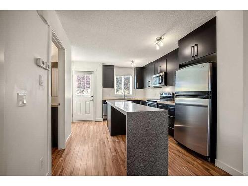 103 Aspen Hills Drive Sw, Calgary, AB - Indoor Photo Showing Kitchen With Stainless Steel Kitchen