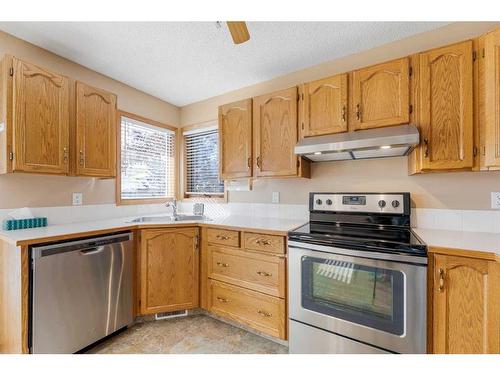 71 Quigley Drive, Cochrane, AB - Indoor Photo Showing Kitchen