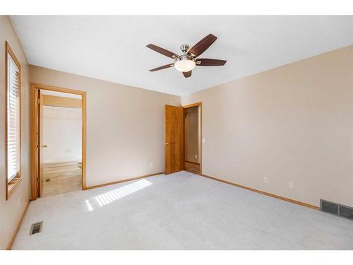 71 Quigley Drive, Cochrane, AB - Indoor Photo Showing Other Room