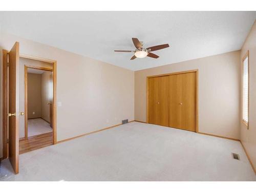 71 Quigley Drive, Cochrane, AB - Indoor Photo Showing Other Room