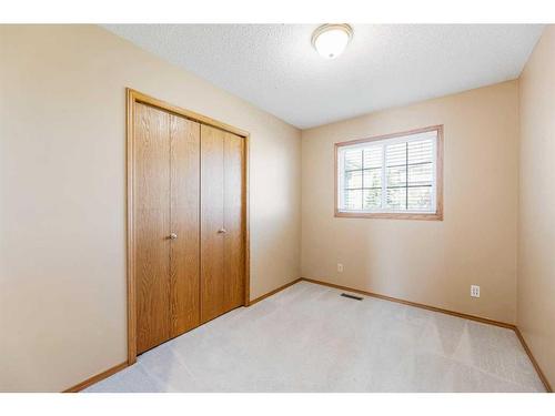 71 Quigley Drive, Cochrane, AB - Indoor Photo Showing Other Room