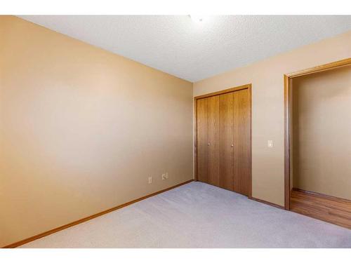 71 Quigley Drive, Cochrane, AB - Indoor Photo Showing Other Room