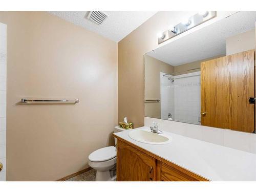 71 Quigley Drive, Cochrane, AB - Indoor Photo Showing Bathroom