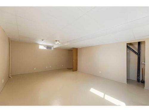 71 Quigley Drive, Cochrane, AB - Indoor Photo Showing Basement