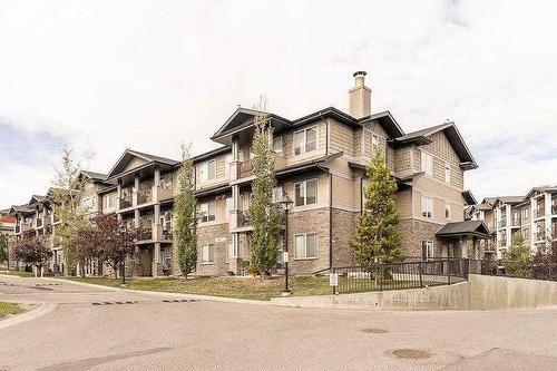 107-10 Panatella Road Nw, Calgary, AB - Outdoor With Facade