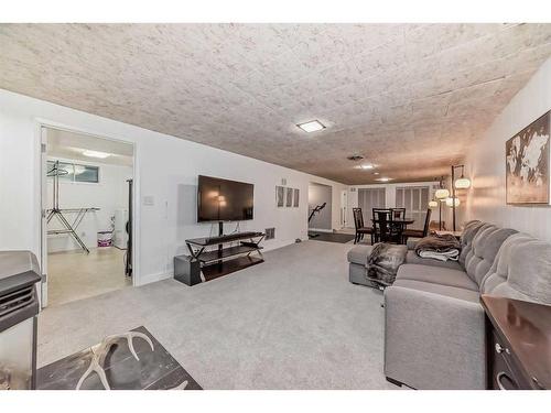 46 Windermere Road Sw, Calgary, AB - Indoor Photo Showing Living Room