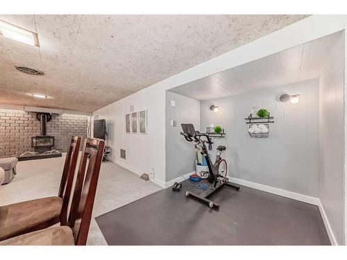 46 Windermere Road Sw, Calgary, AB - Indoor Photo Showing Gym Room