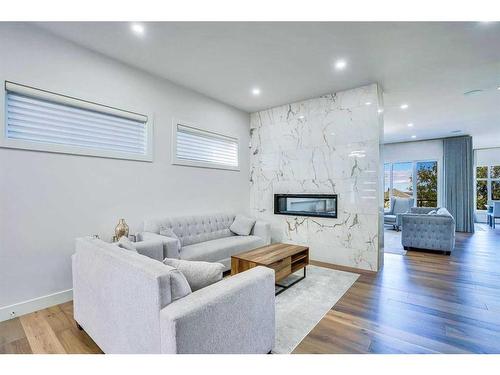 108 Hampstead Mews Nw, Calgary, AB - Indoor Photo Showing Living Room With Fireplace