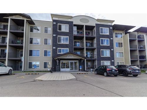 2408-625 Glenbow Drive, Cochrane, AB - Outdoor With Facade