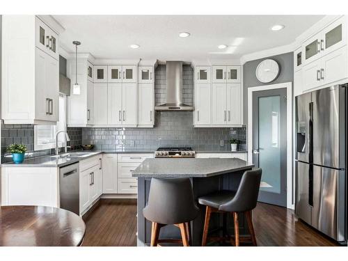 228 Stonegate Place Nw, Airdrie, AB - Indoor Photo Showing Kitchen With Upgraded Kitchen