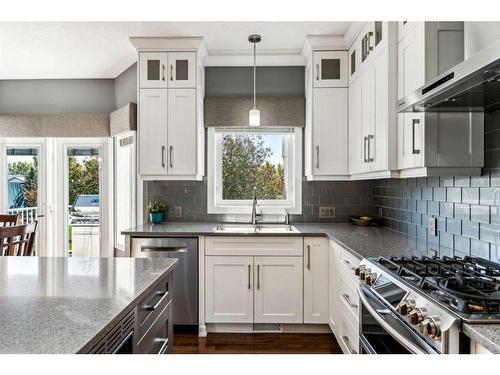 228 Stonegate Place Nw, Airdrie, AB - Indoor Photo Showing Kitchen With Double Sink With Upgraded Kitchen