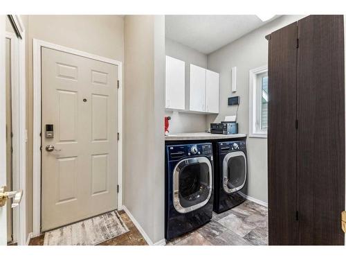 228 Stonegate Place Nw, Airdrie, AB - Indoor Photo Showing Laundry Room