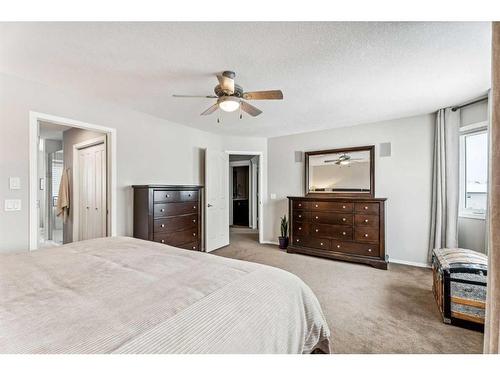 228 Stonegate Place Nw, Airdrie, AB - Indoor Photo Showing Bedroom