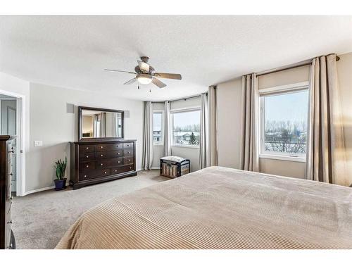 228 Stonegate Place Nw, Airdrie, AB - Indoor Photo Showing Bedroom