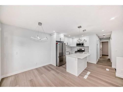 6129 Maddock Drive Ne, Calgary, AB - Indoor Photo Showing Kitchen With Stainless Steel Kitchen