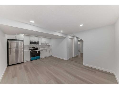 6129 Maddock Drive Ne, Calgary, AB - Indoor Photo Showing Kitchen With Stainless Steel Kitchen